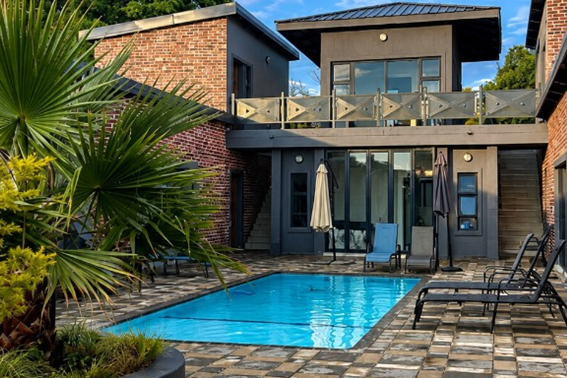 Swimming pool and patio at Bontle R
